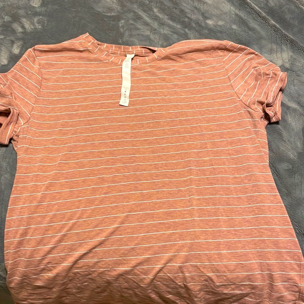 Pink and white stripped running top